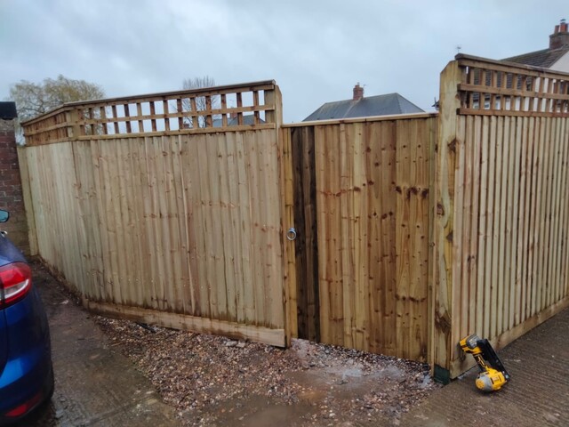 Close board fence with gate at a home in Swindon
